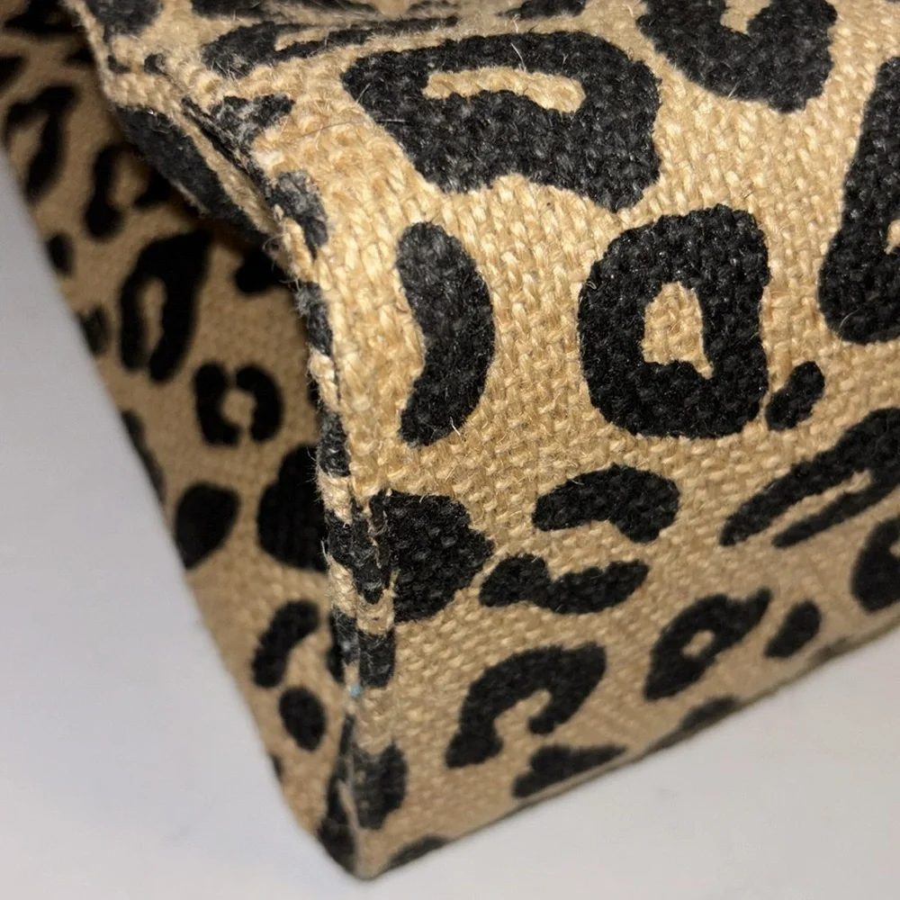 AMERICA & BEYOND TAN AND BLACK LEOPARD PRINT JUTE/CANVAS TOTE WITH TASSEL